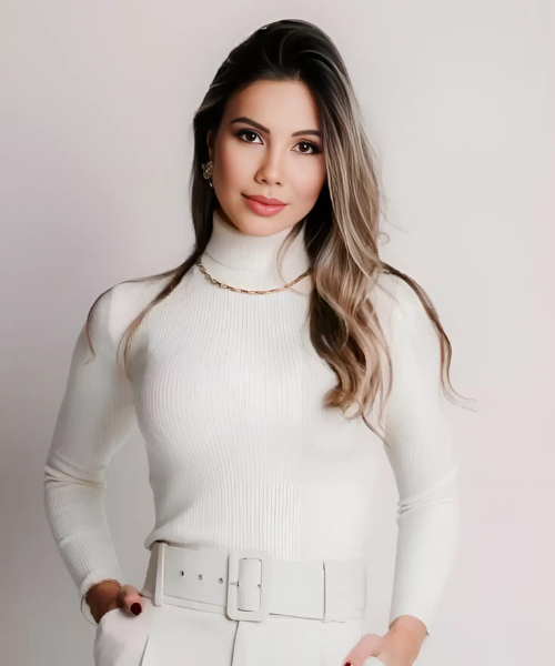 Gorgeous lady standing putting hands in pocket